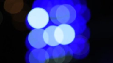 Bokeh odaklı ışıklarla şenlikli soyut arkaplan.