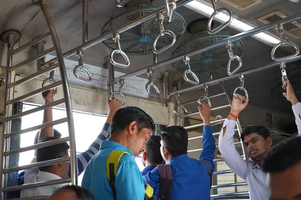 Unidentified Passengers Standing on the Doors of Running Local Train during  Rush Hours Editorial Photography - Image of station, india: 168031082