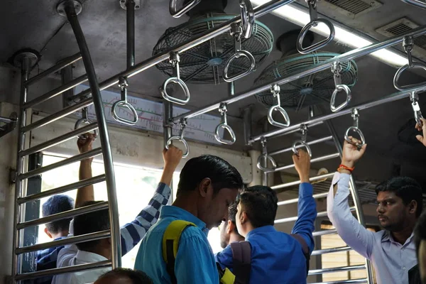 Unidentified Passengers Standing on the Doors of Running Local Train during  Rush Hours Editorial Photography - Image of station, india: 168031082