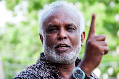 Delhi, Hindistan yolunda protesto yapan sosyal aktivist..