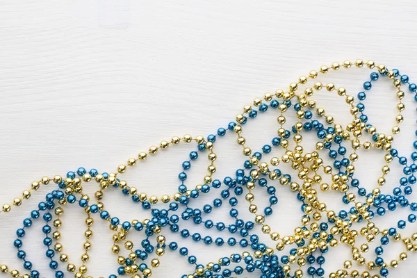 Golden and blue beads — Stock Photo, Image