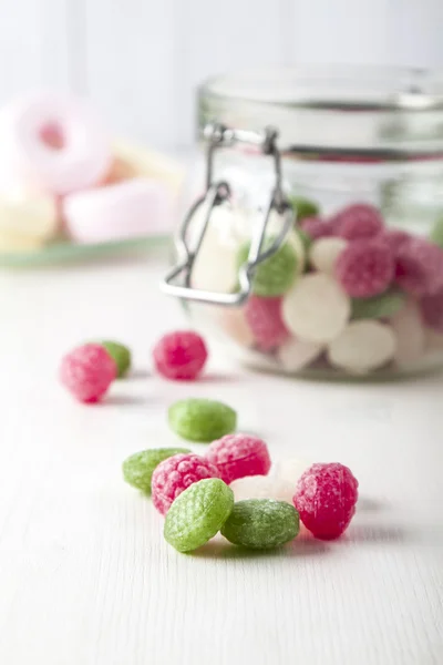 Sweet candies in glass jars Royalty Free Stock Images