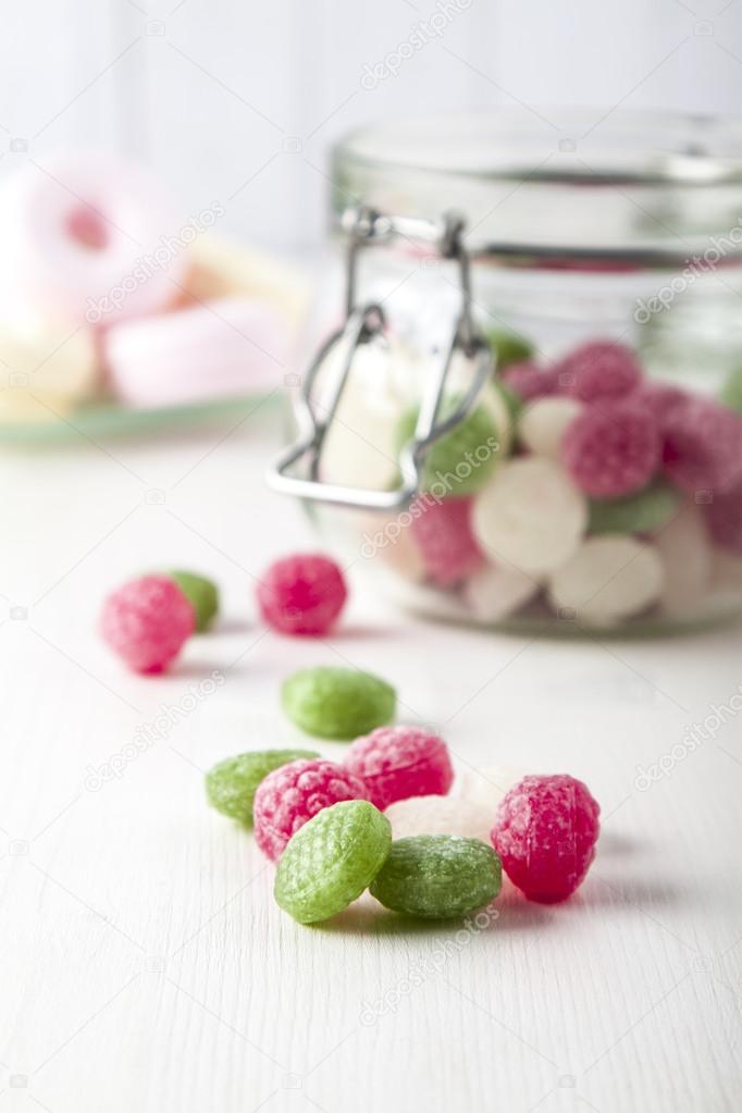 Sweet candies in glass jars