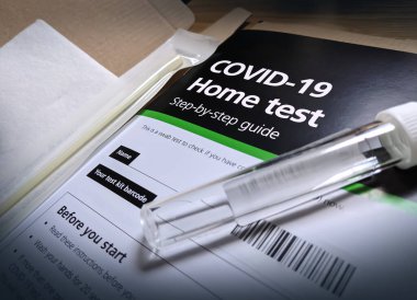 View of Covid 19 Coronavirus Home Test with Vial Sample from UK Health clipart