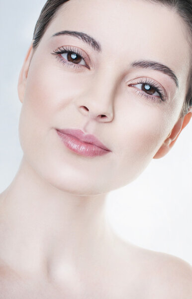 Beauty portrait model with natural make up. Studio shot on white background