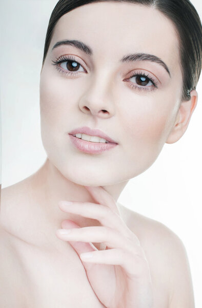 Beauty portrait model with natural make up.  Studio shot on white background