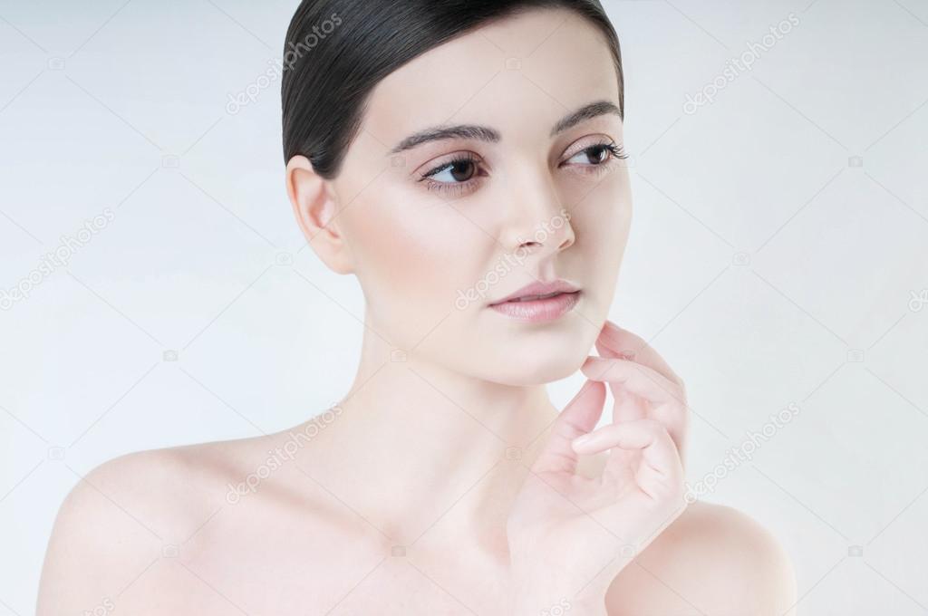Beauty portrait model with natural make up.  Studio shot on white background