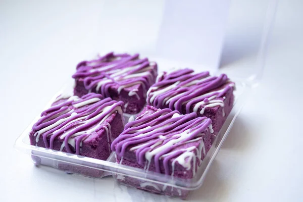Purple Sweet Potato Brownie Cake on a white background