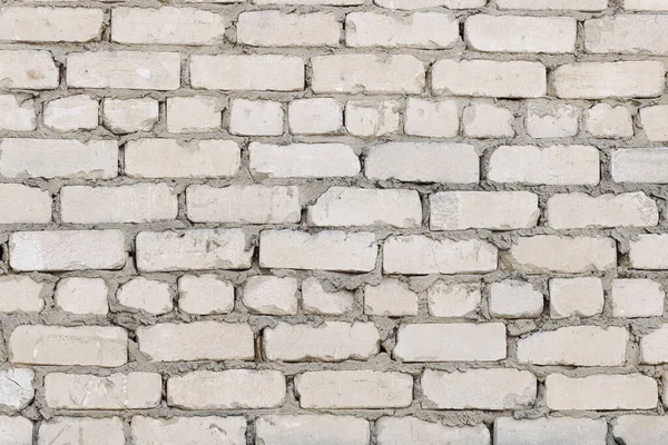 Parçalanmış beyaz tuğla bir duvar