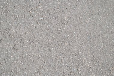 Açık arkaplan asfalt dokusu güneş tarafından aydınlatılır tüm çerçeve için, gri ve kirli