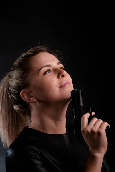 Attractive Blonde Girl Thoughtfully Holding Black Pistol Very Dark Background — Stock Photo, Image