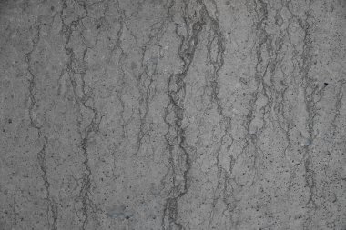 Çatlak ve küçük delikli beton duvar dokusu