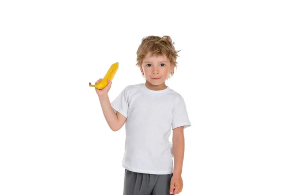 Хлопчик Тримає Стиглий Жовтий Банан Правій Руці Він Одягнений Просту — стокове фото