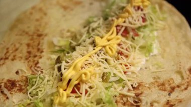 A chef makes lavash in a caf. Close-ups.