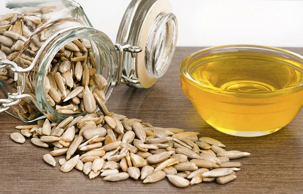 Sunflower seeds from a Mason Jar with Oil — Stock Photo, Image