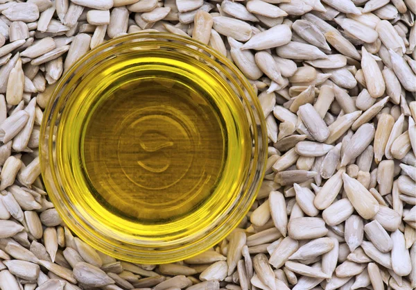 Sunflower oil with sunflower seeds — Stock Photo, Image