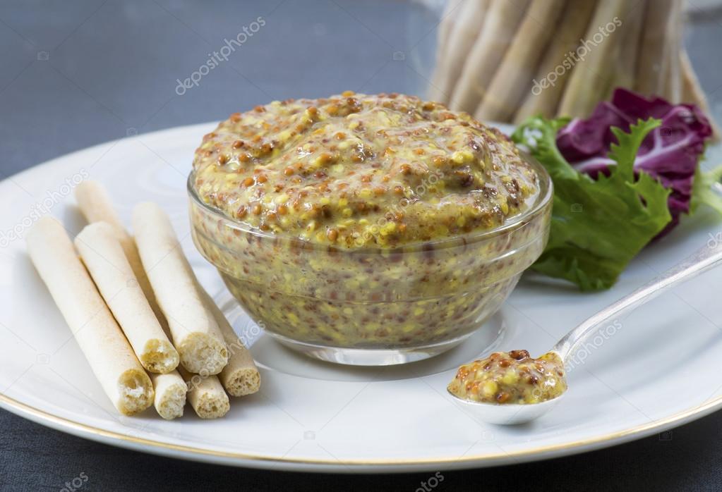 Mustard in a glass dish