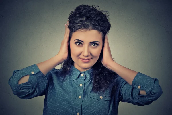 Happy attractive casual woman covering with hands her ears eyes opened — Stock Photo, Image