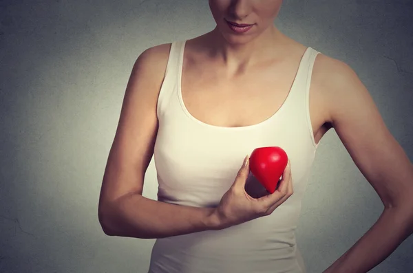 Closeup cropped image young woman holding red drop of blood — 스톡 사진