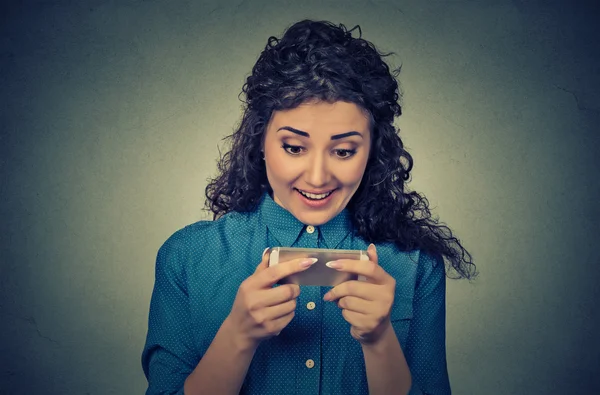 Woman holding using new smartphone mobile phone connected browsing internet — Stockfoto