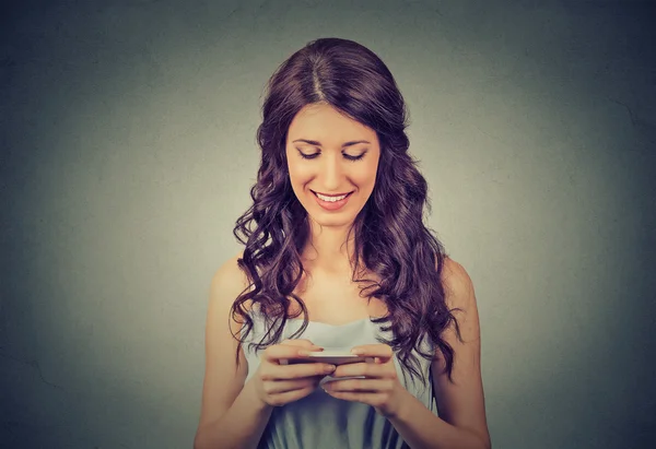 Woman holding using new smartphone connected browsing internet worldwide — Stock fotografie