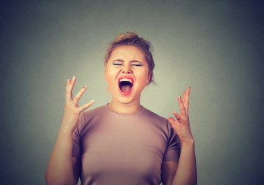 angry young woman screaming  clipart
