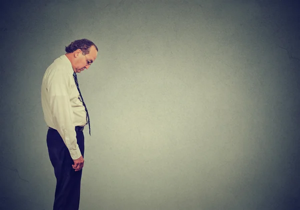 Sad lonely middle aged business man looking down has no energy motivation in life depressed — Stock Photo, Image