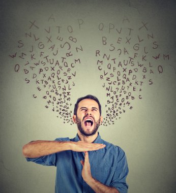 Young man showing time out hand gesture, frustrated screaming to stop