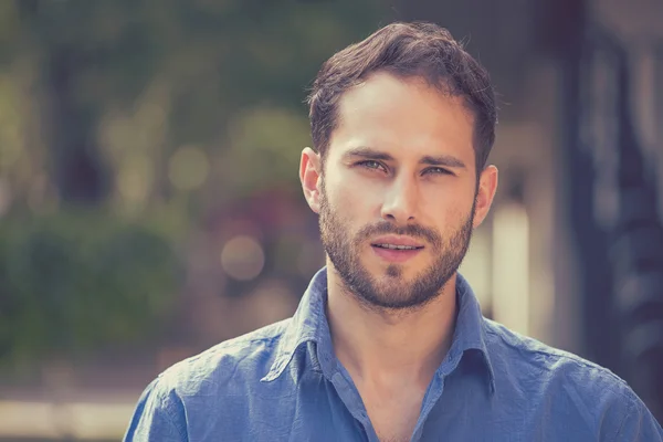 Closeup portrait of happy modern young man standing outdoors — Stock Photo, Image