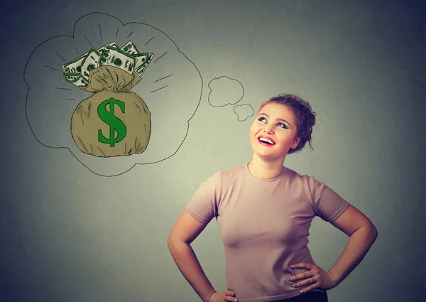 Happy woman thinking looking up dreaming of financial succes — Stock Photo, Image