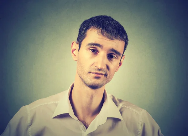 Skeptical man looking with disapproval on his face. — Stock Photo, Image