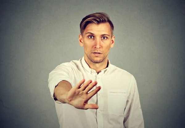 Young man with stop hand gesture — Stock Photo, Image