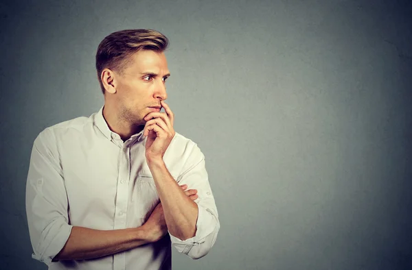 Side profile preoccupied anxious young man — Stock Photo, Image