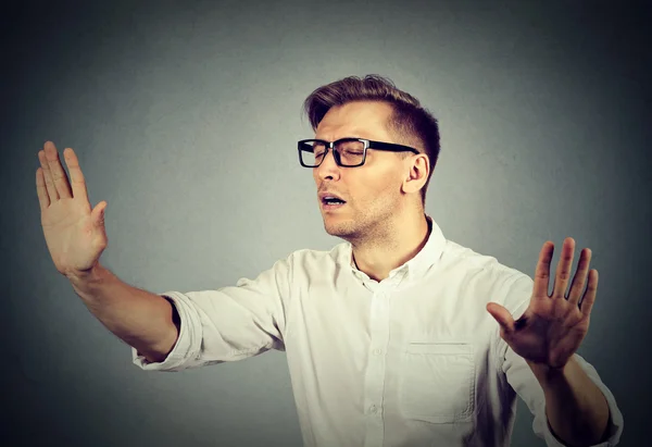 Blindfolded business man stretching arms out eyes closed sightless — Stock Photo, Image