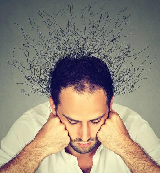 Sad man with stressed face expression brain melting into lines — Stock Photo, Image