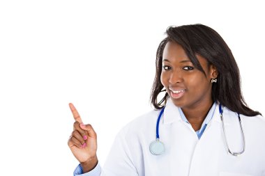 Female doctor pointing at copy space clipart