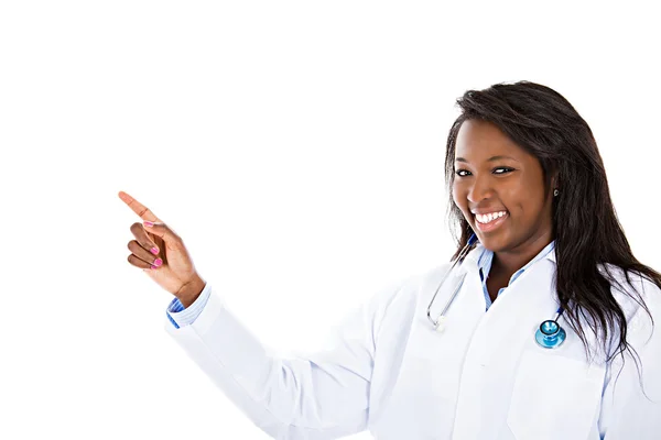 Female health care professional pointing at copy space — Stock Photo, Image