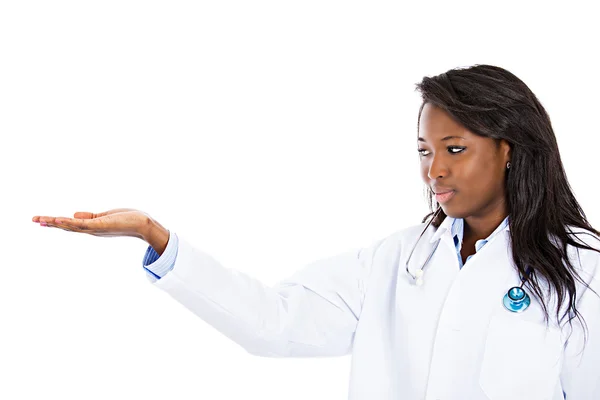 Female health care professional pointing at copy space — Stock Photo, Image