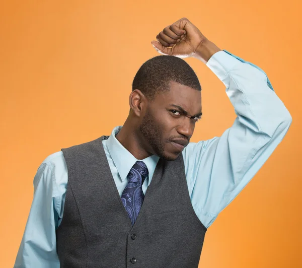 Man, smelling sniffing his armpit, something stinks bad — Stock Photo, Image