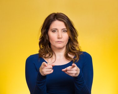 Serious woman pointing finger at someone, blaming clipart