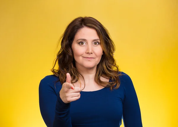 Happy woman smiling, pointing finger towards you — Stock Photo, Image