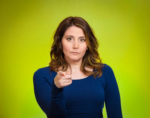 Serious woman pointing finger at someone, blaming — Stock Photo, Image