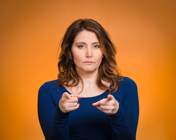 Serious woman pointing finger at someone, blaming — Stock Photo, Image