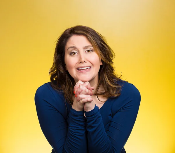 Woman gesturing with clasped hands, pretty please with sugar on top — Stock Photo, Image