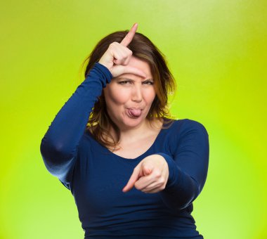 Mad pissed off woman, showing loser sign