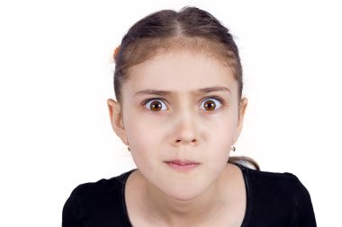 Girl looking suspicious, disapproval, surprise on face clipart