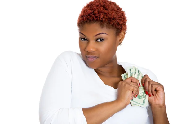 Mujer joven codiciosa sosteniendo billetes de dólar con fuerza — Foto de Stock