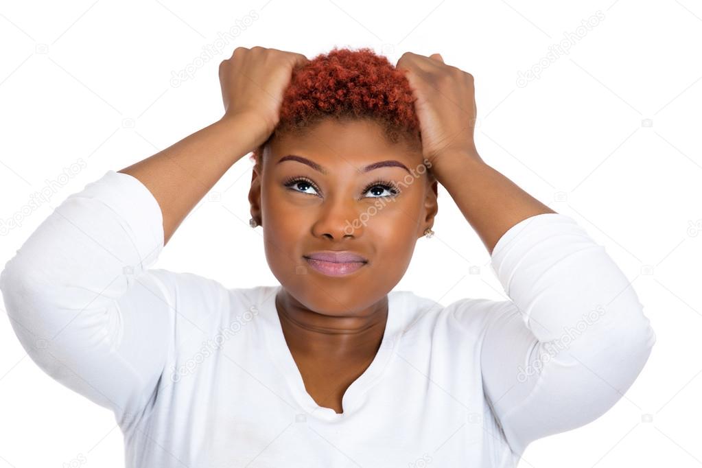 Frustrated woman pulling her hair out, having bad headache, stressed