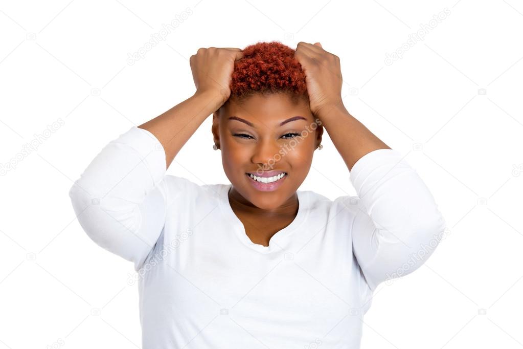 Frustrated woman pulling her hair out, having bad headache, stressed
