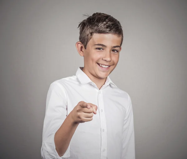 Teenager laughing, pointing with finger at someone — Stock Photo, Image